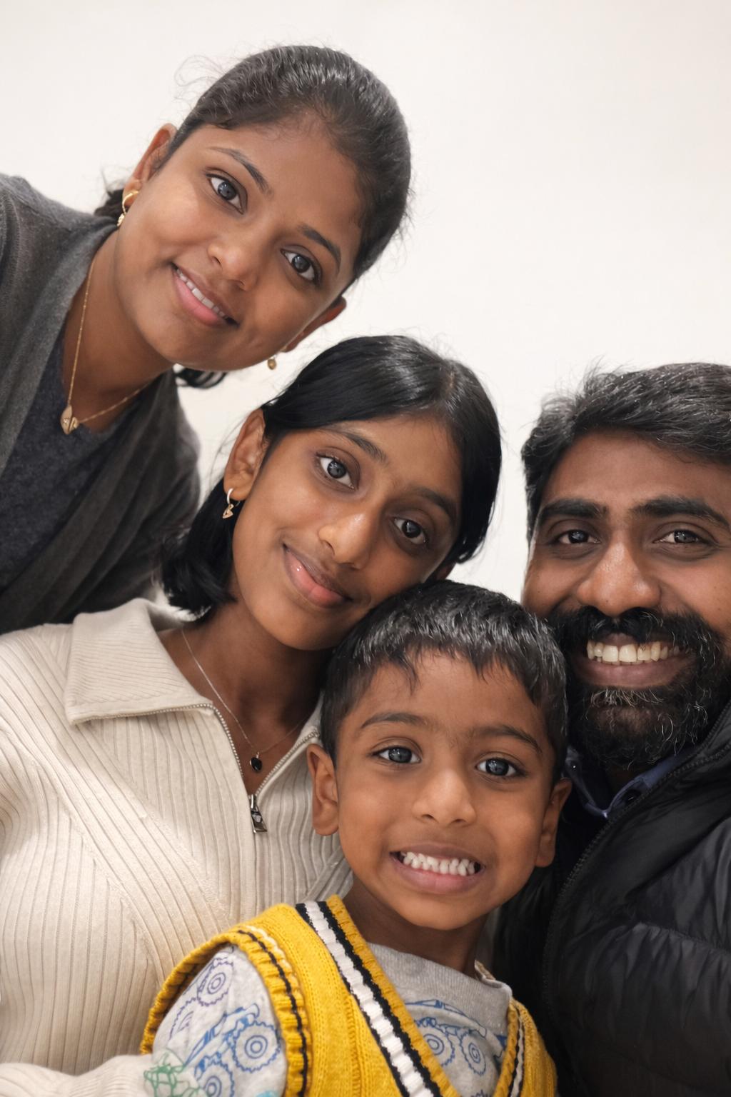 Senthil and Muthu with their family, founders of Little Roses Early Learning